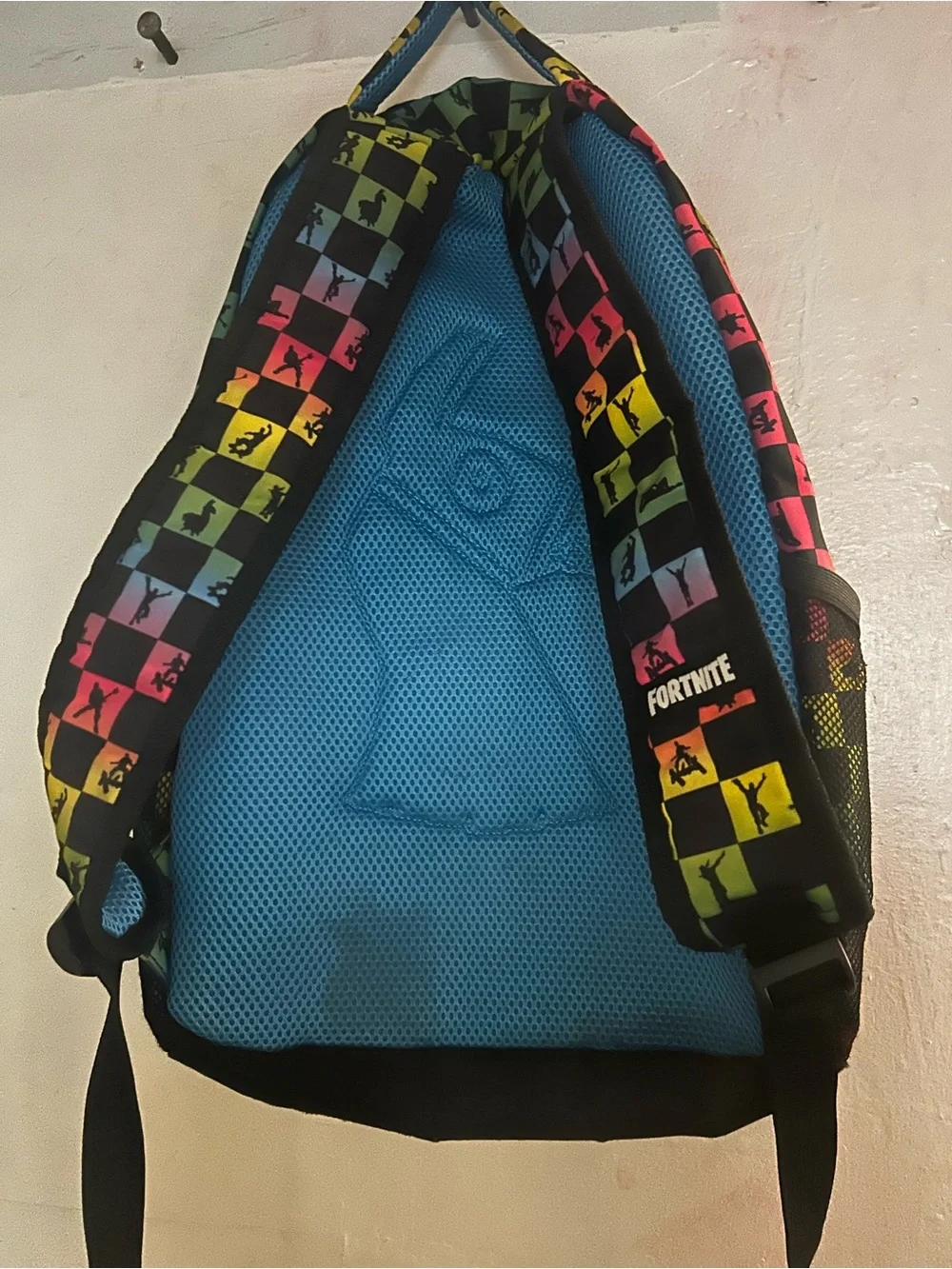Black Backpack with Rainbow Checkerboard Pattern
